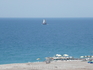 Пляж, море, парус одинокий. Вид из окна. Пляж, море, парус одинокий. Вид из окна.