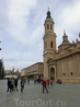 Если смотреть влево от собора, то в другом конце площади виднеется фонтан Hispanidad и церковь Iglesia de San Juan de los Panetes. 
Я знала, что в одной ...