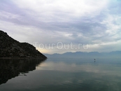 Уникальное Скадарское озеро, часть которого принадлежит Албании. Уровень его зимой и летом сильно отличается. Причем уровень его из года в год растет. ...