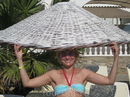На пляже были вот такие невысокие зонтики, ну почти шляпки :)
