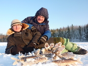 Я, Андрей, с сыном Андреем. Я всегда его беру на рыбалку, когда лед толщиной более 30см.
