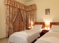 Palm Land Hotel Suites