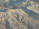 Горы с самолета, возможно Кавказ