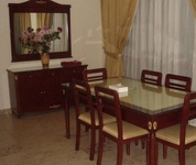 Al Commodore Suites
