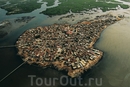 Жоаль-Фадиут (Joal-Fadiouth), Сенегал
Жоаль-Фадиут - одно из самых красивых поселений западного Сенегала