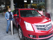 На территории Santa Monica Place Mall. Довольно популярный и совершенно новый автомобильчик Cadillac стоимостью примерно 50000$.