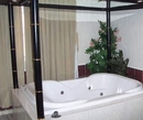 Фото Sullies Suites