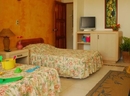 Фото Coco Plum Beach Hotel