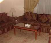 Al Commodore Suites