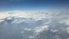 в облаках над Грецией во время полета