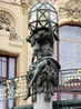 Орнаментальный декор фасада и статуи факельщиков на опорах балкона создал К. Новак.