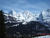 Знаменитые вершины Бернских Альп: Айгер (3970 м.), Мёнх (4107 м.) и Юнгфрау (4158 м.).