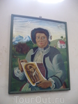 портрет М.Лори  на стене церкви в месте прошений.