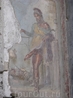 Фреска в Доме Веттиев (Помпеи), изображающая Приапа.Приап в античной мифологии древнегреческий бог плодородия.
