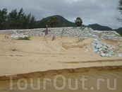 мешки с песком приготовлены для защиты от воды