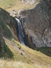 печеночный водопад, рядом на низине  из под земли бьет  источник  нарзан