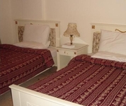 Al Commodore Suites