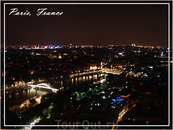 вид на ночной Париж с Эйфелевой башни